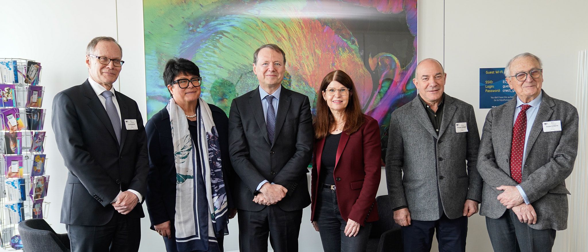 Group photo from the HBP-EBRAINS Exhibition featuring Jan Bjaalie, Sabine Verheyen, Roberto Viola, joint-CEOs of EBRAINS Katrin Amunts and Phillippe Vernier as well as chairman of the board André Syrota